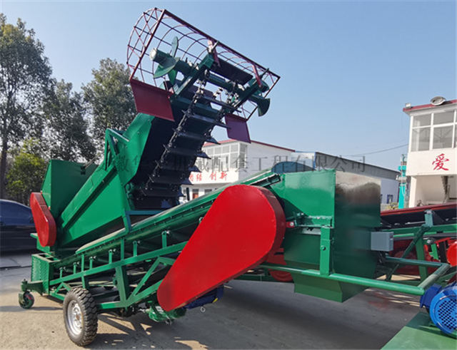 Image of mobile multi-function grain loading scraper
